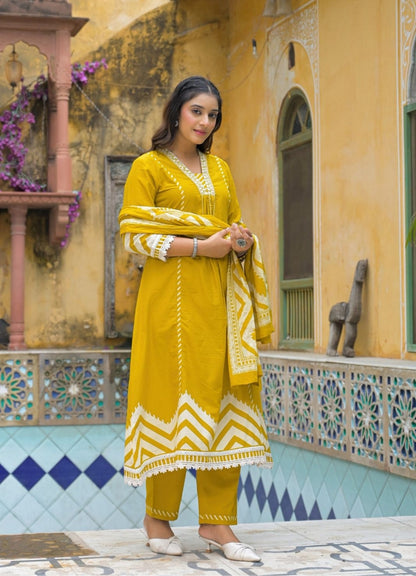 Mustard Yellow Cotton Suit Set with Ethnic Print with Lace & Tassel Detailing
