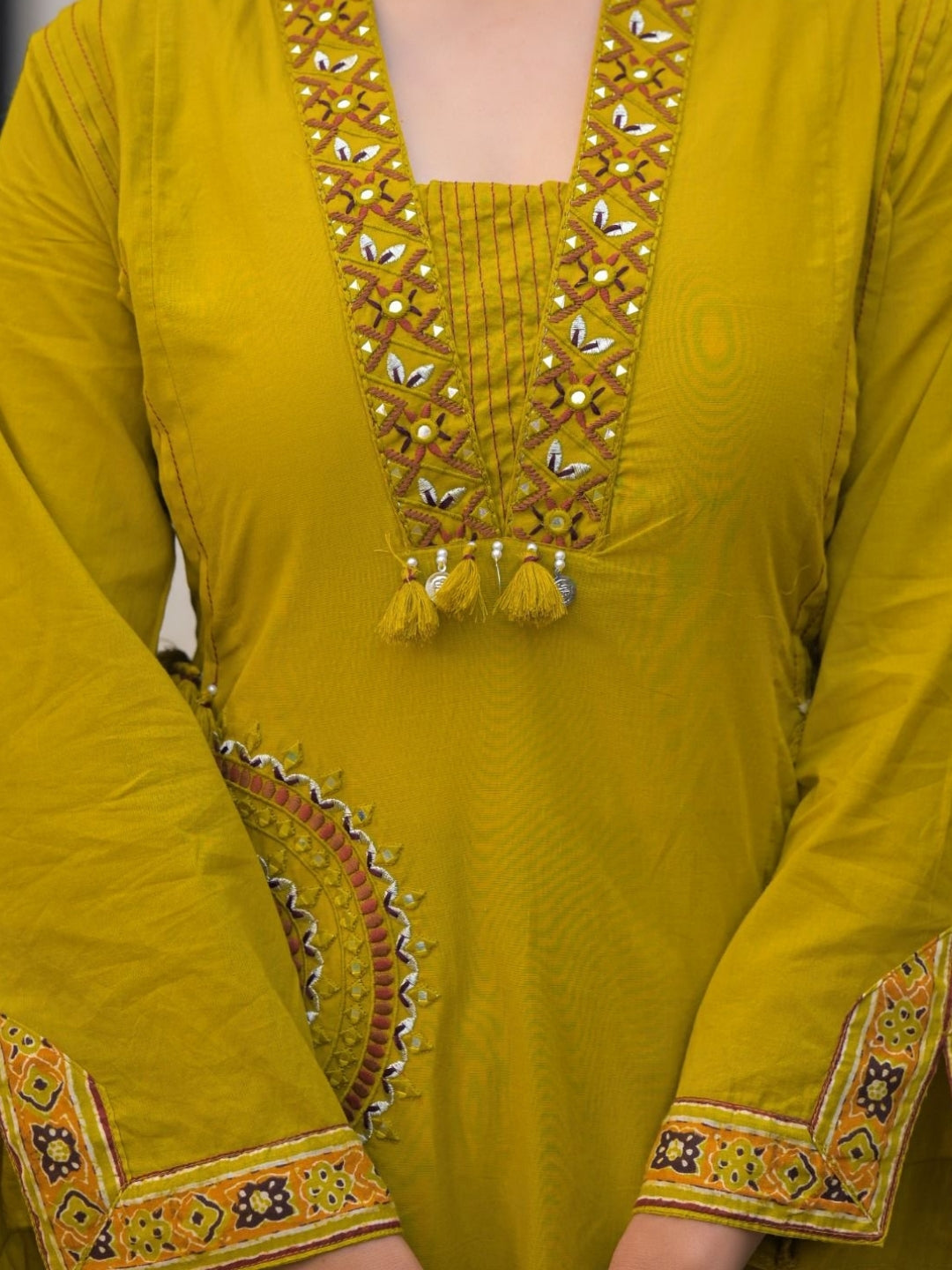Mustard Yellow Pure Cotton A-Line Kurta Set with Applique Work and Mirror Embroidery